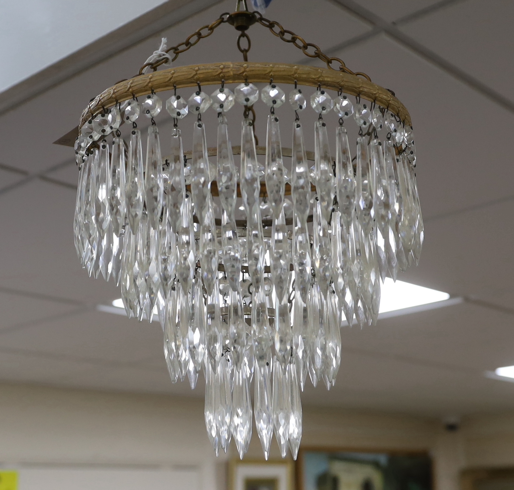 A pair of cut glass four tier chandeliers, 26.5cm wide